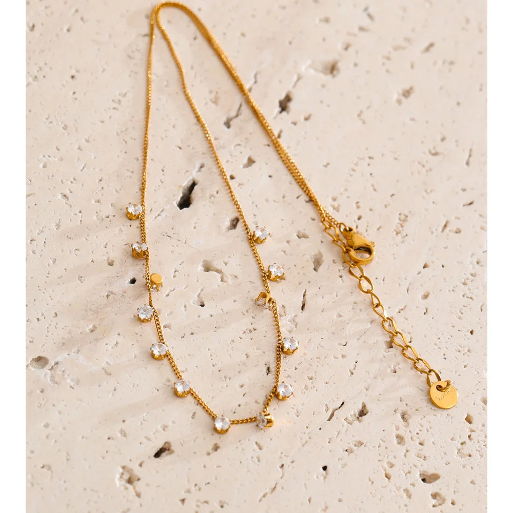 Cubic zirconia geometric necklace in gold-plated stainless steel with cubic zirconia.