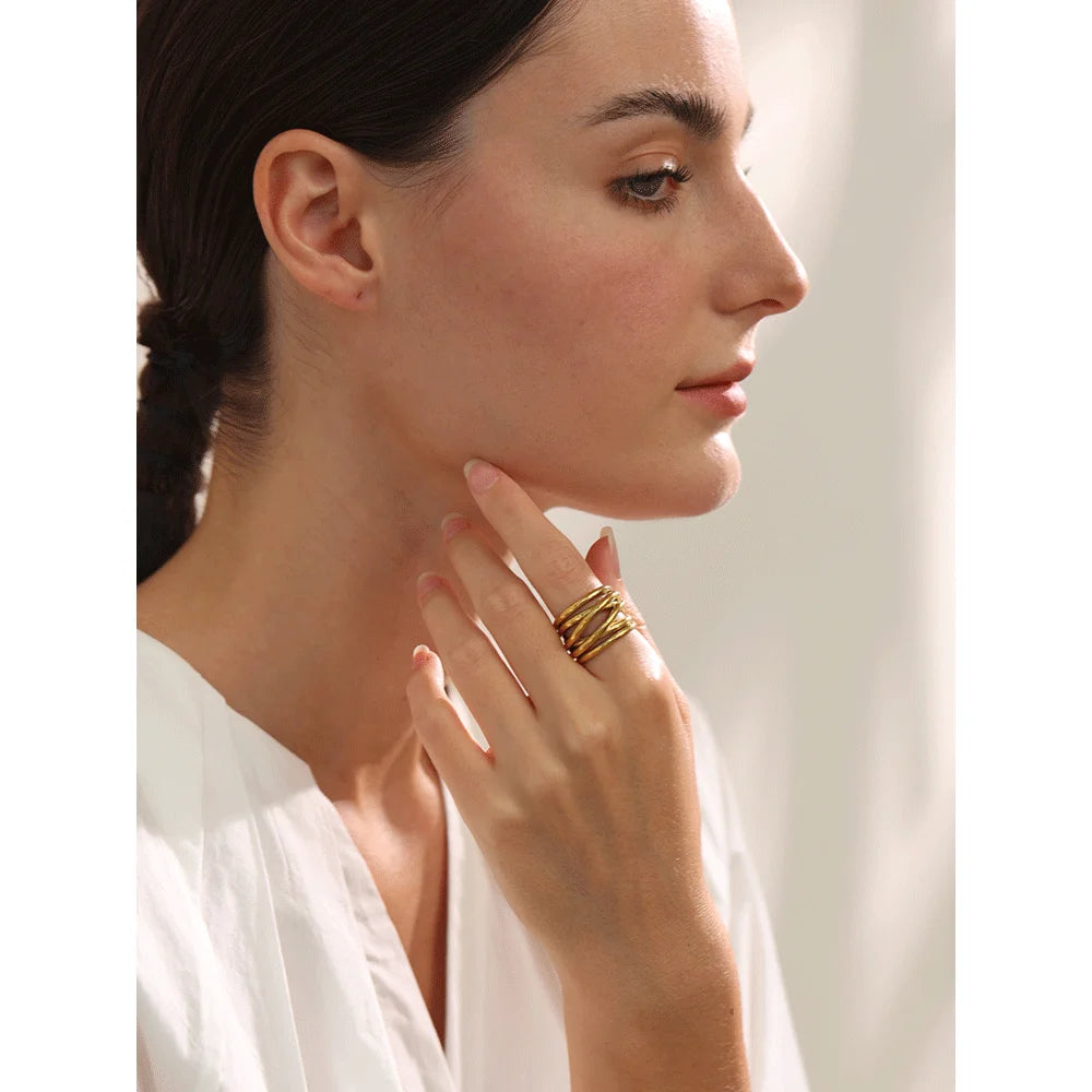 Geometric ring in 18K gold-plated stainless steel.