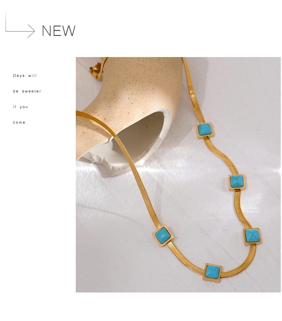 Blue natural stone snake necklace in gold-plated stainless steel with natural stone.