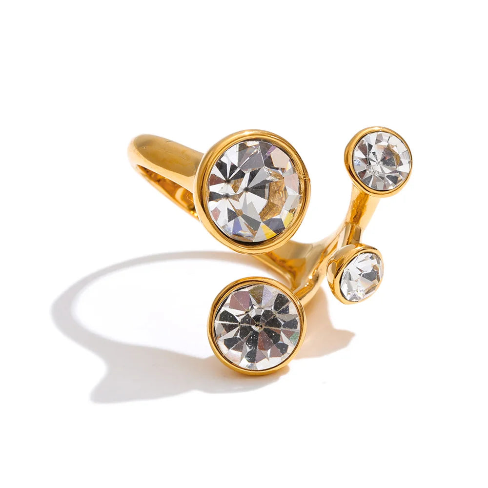 Crystal geometric ring in 18K gold-plated stainless steel with crystal.