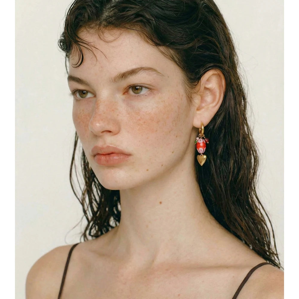 Red heart earrings in gold-plated stainless steel.