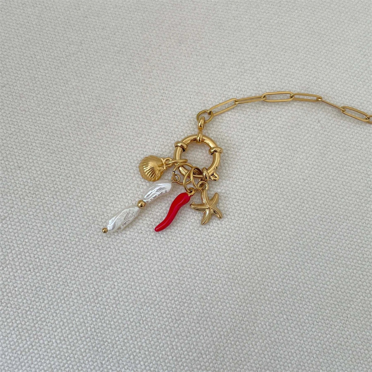 Stainless steel fruit heart boots ins high-end feeling collarbone chain pearl starfish gold-plated color preservation