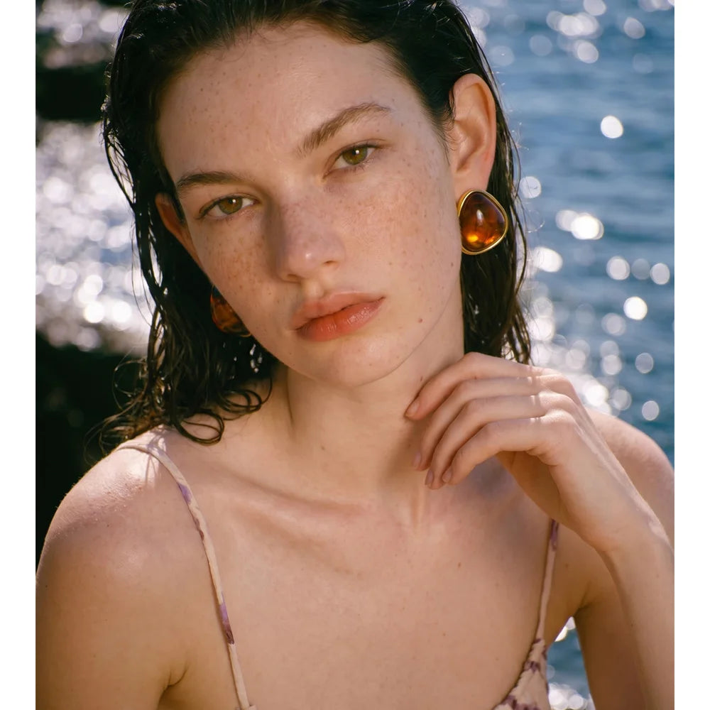Resin acrylic multi-color earrings in gold-plated stainless steel with resin and acrylic.
