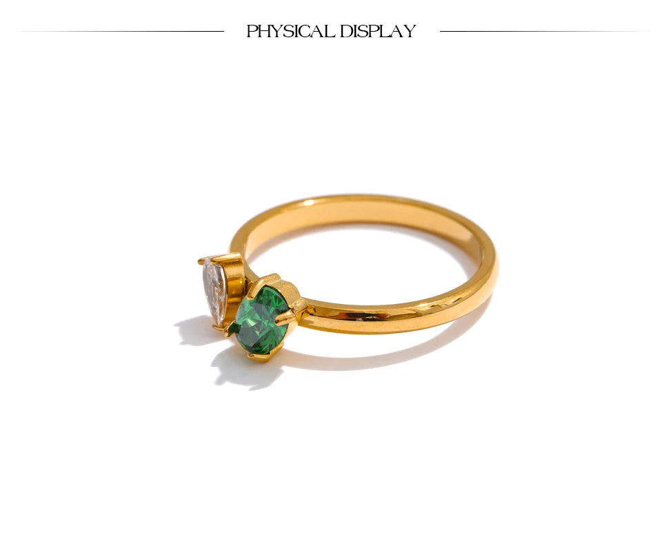 Cubic zirconia geometric ring in 18K gold-plated stainless steel with cubic zirconia.