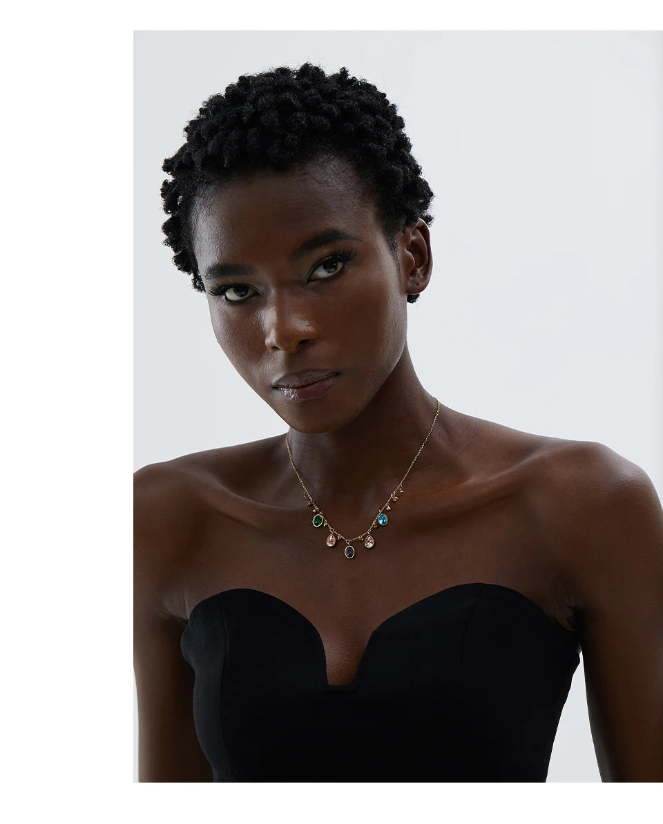 Cubic zirconia multi-color geometric necklace in gold-plated stainless steel with cubic zirconia.