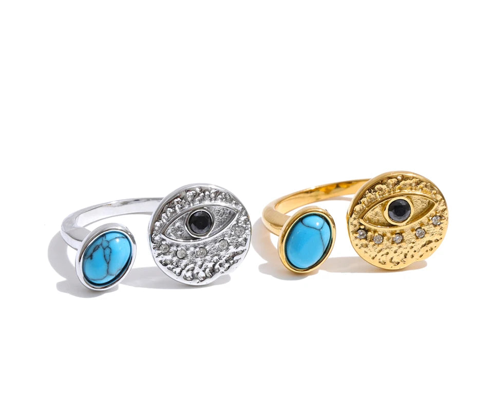 Cubic zirconia natural stone geometric ring in 18K gold-plated stainless steel with cubic zirconia and natural stone.