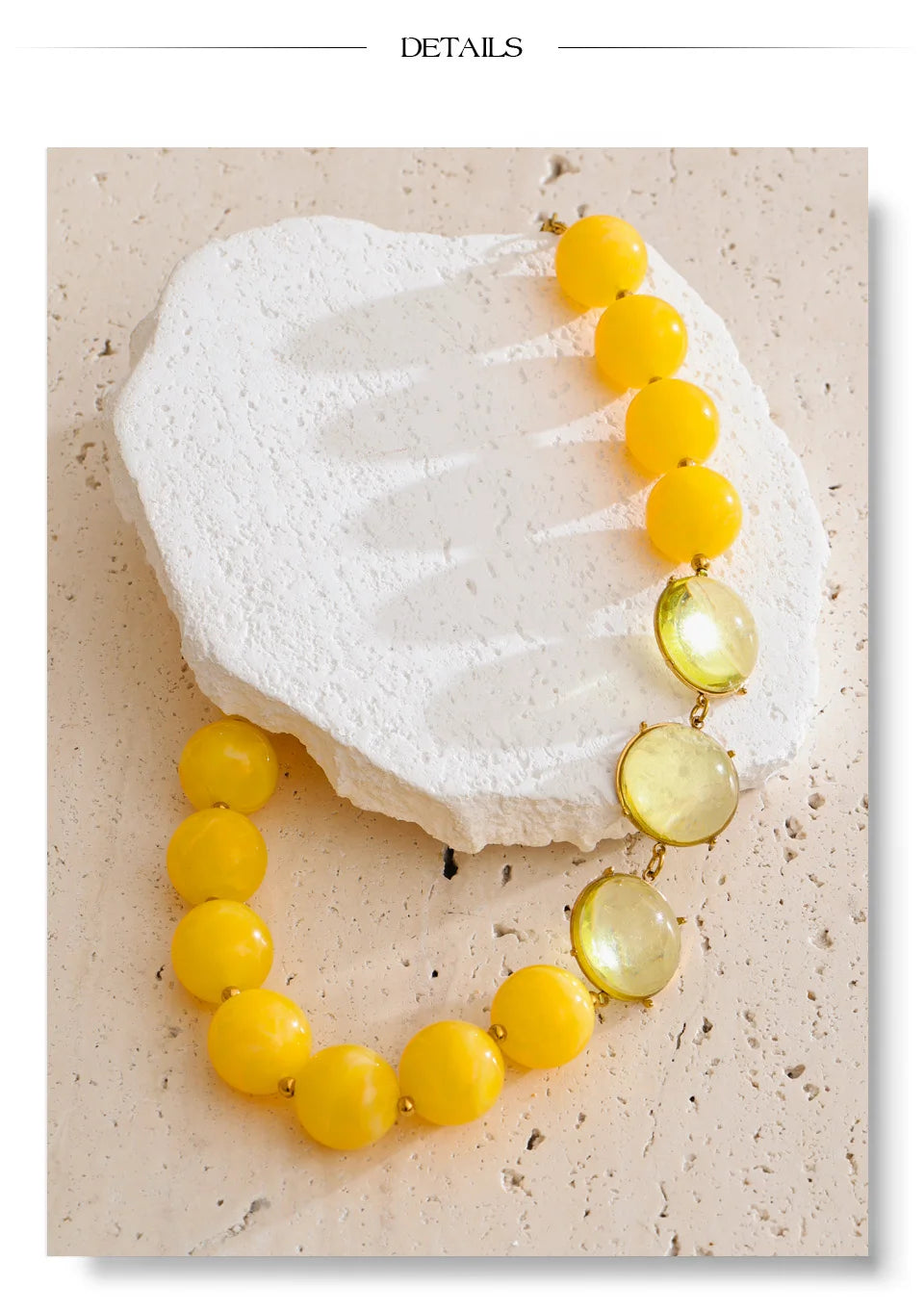 Resin acrylic beaded necklace in gold-plated stainless steel with resin and acrylic.