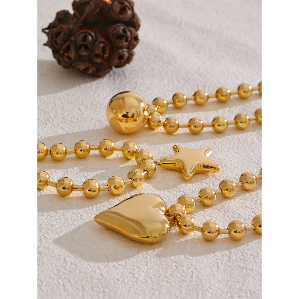 Heart star beaded necklace in gold-plated stainless steel.