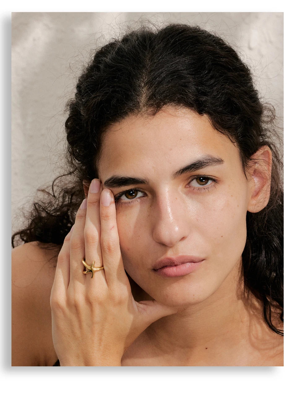 Star geometric ring in gold-plated stainless steel.