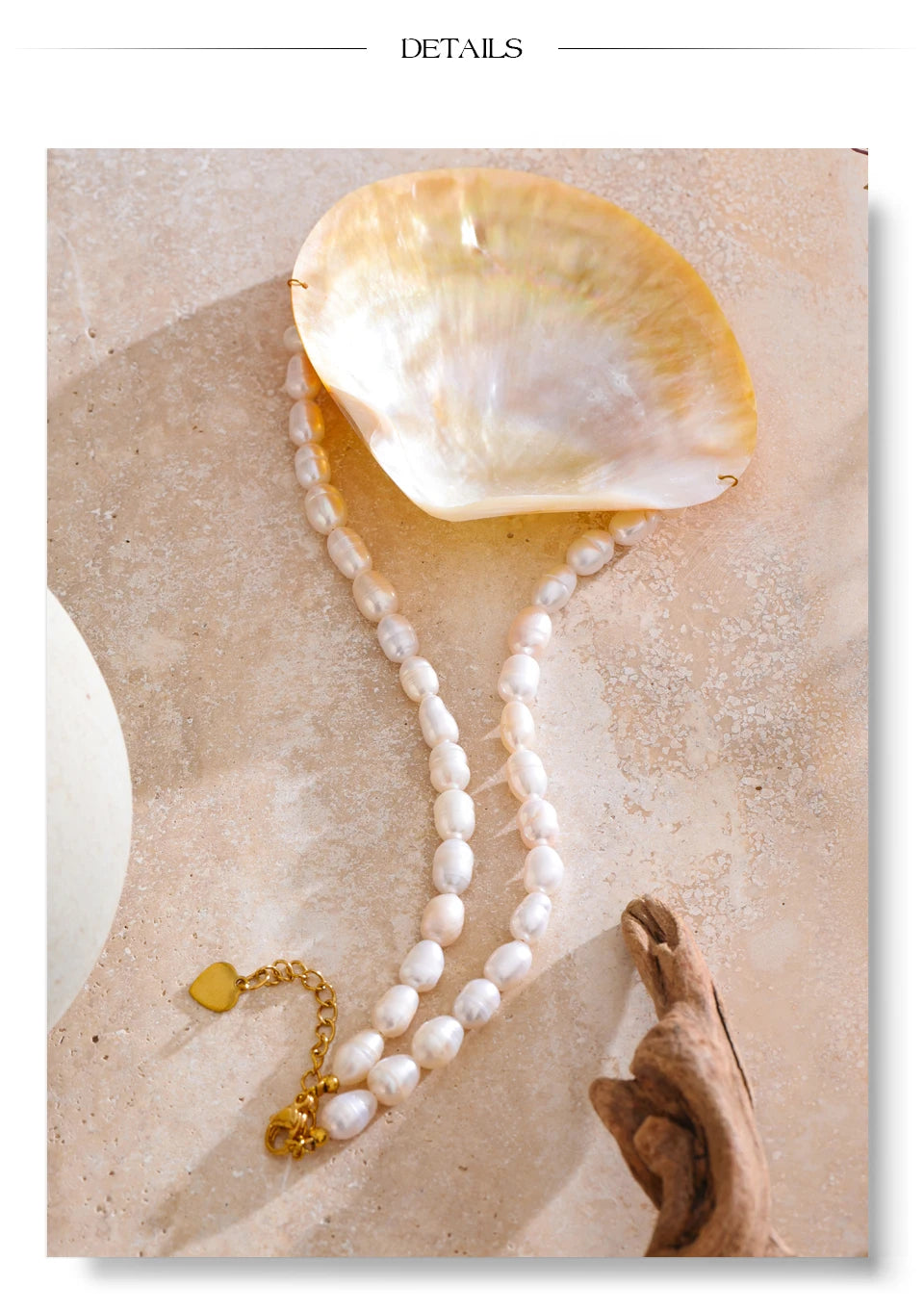 Pearl shell geometric necklace in gold-plated stainless steel with pearl and shell.