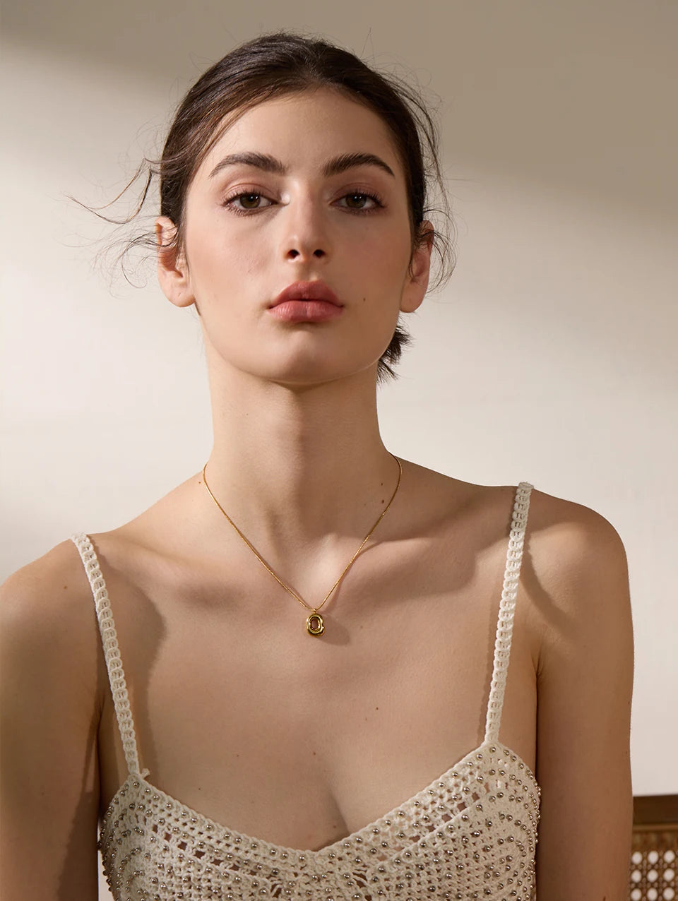 Geometric necklace in gold-plated 316L stainless steel.