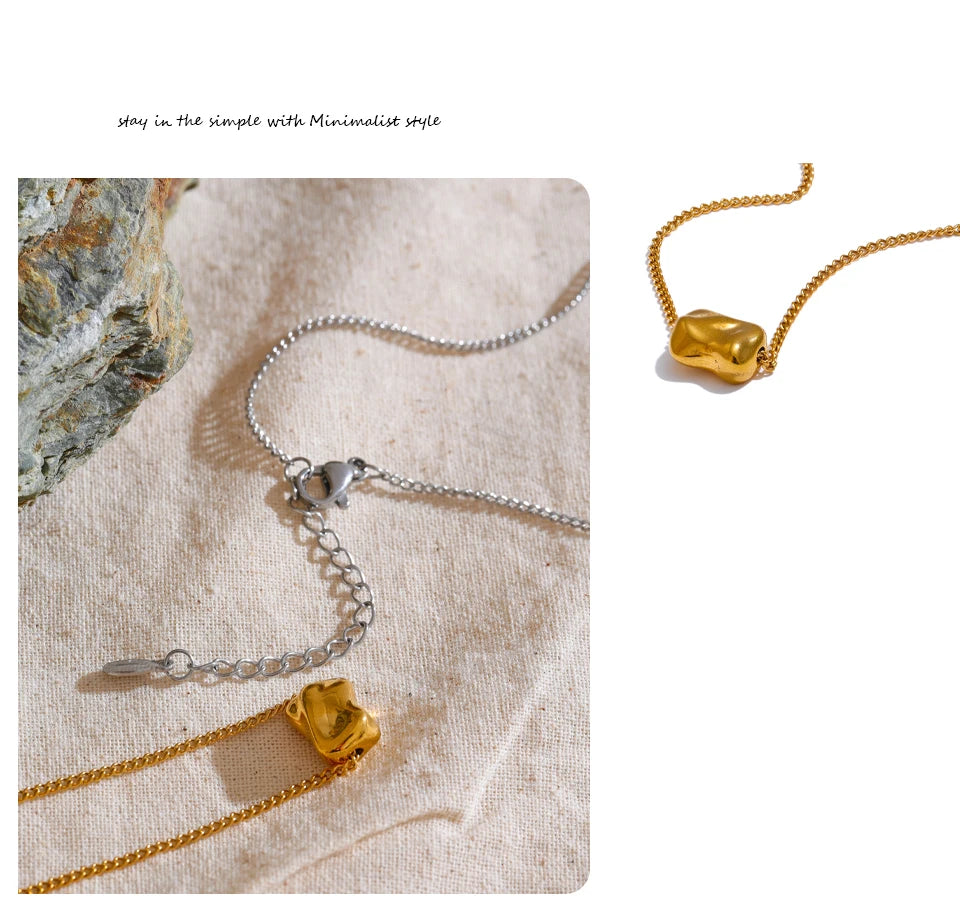Hammered geometric necklace in gold-plated stainless steel.
