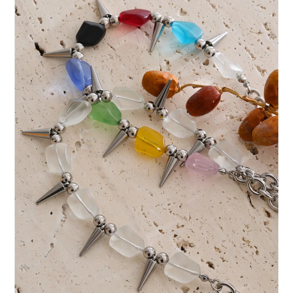 Acrylic natural stone multi-color necklace in gold-plated stainless steel with natural stone and acrylic.