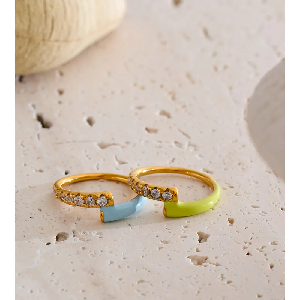 Green cubic zirconia enamel ring in 18K gold-plated stainless steel with cubic zirconia and enamel.