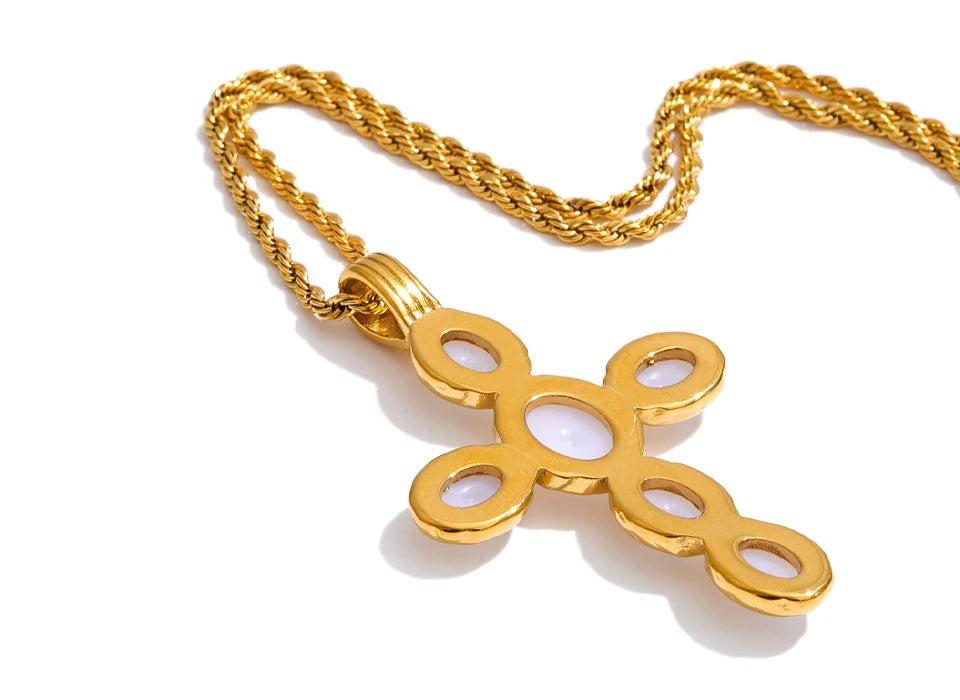 Pearl cross necklace in gold-plated stainless steel with pearl.