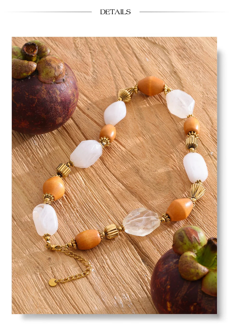 Resin beaded geometric necklace in gold-plated stainless steel with resin.