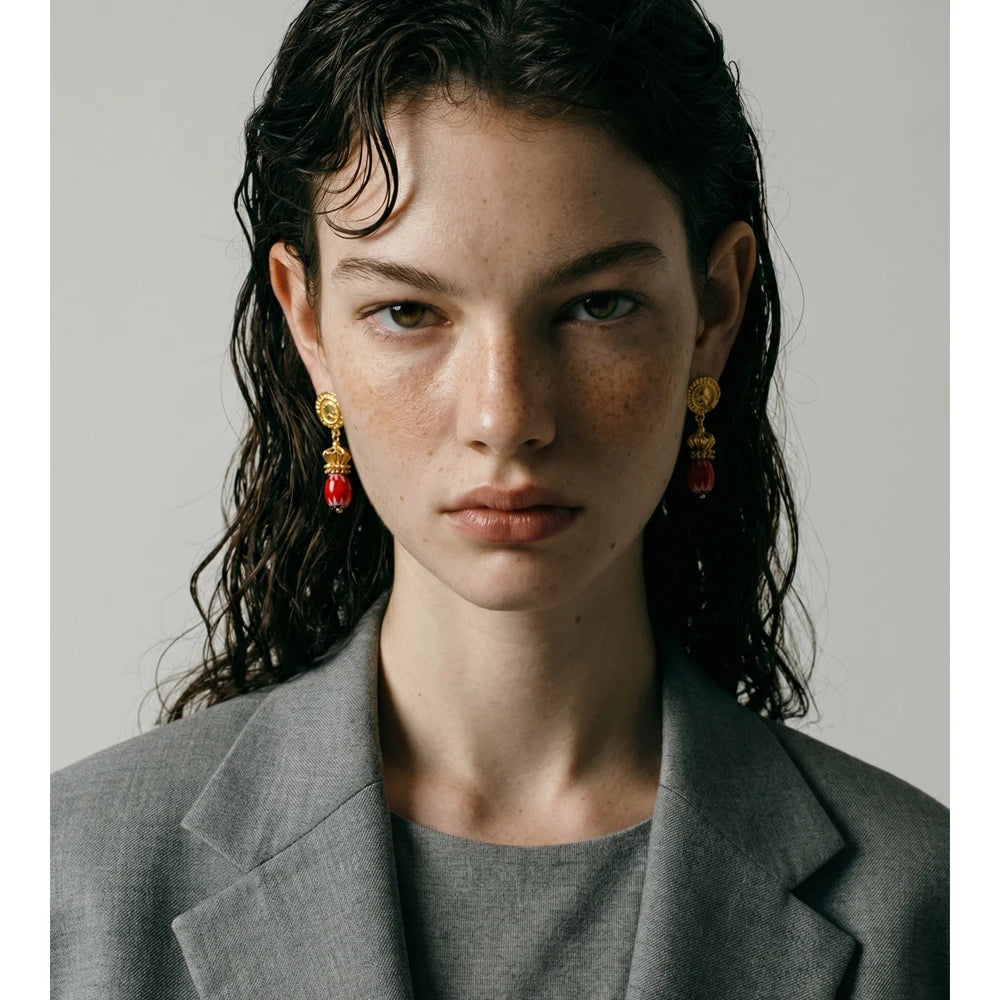 Geometric earrings in gold-plated stainless steel.