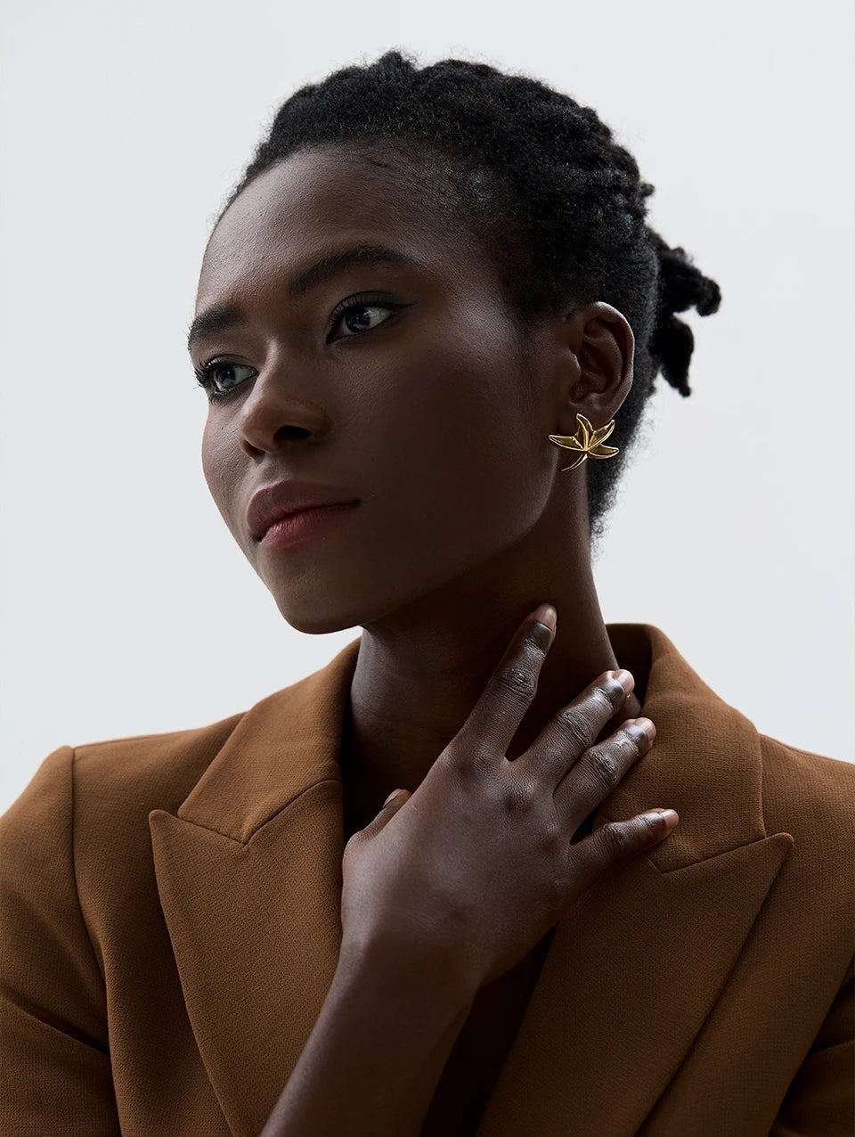 Star earrings in gold-plated 316L stainless steel.