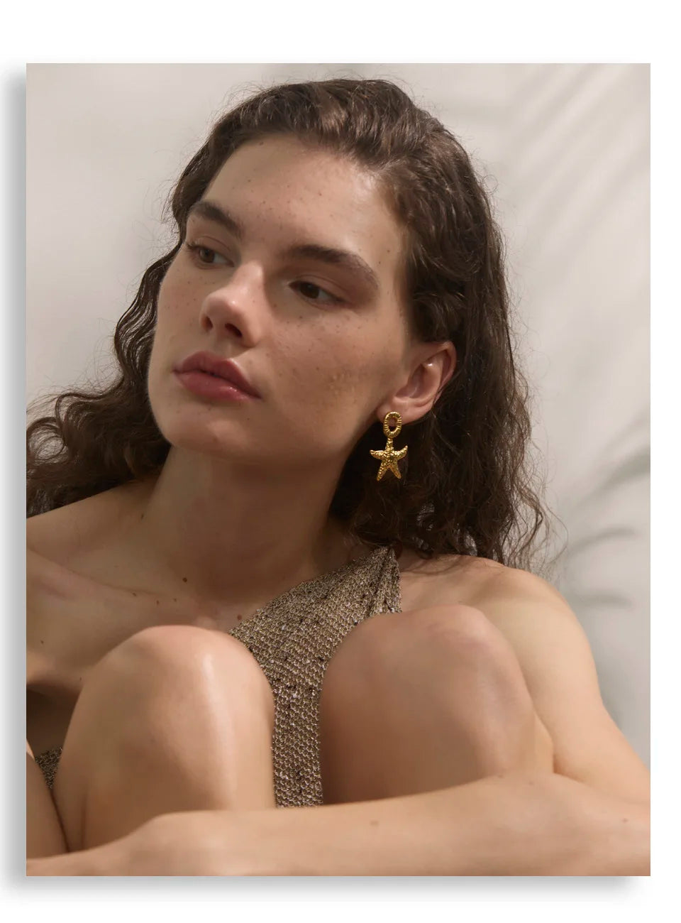 Star earrings in gold-plated stainless steel.