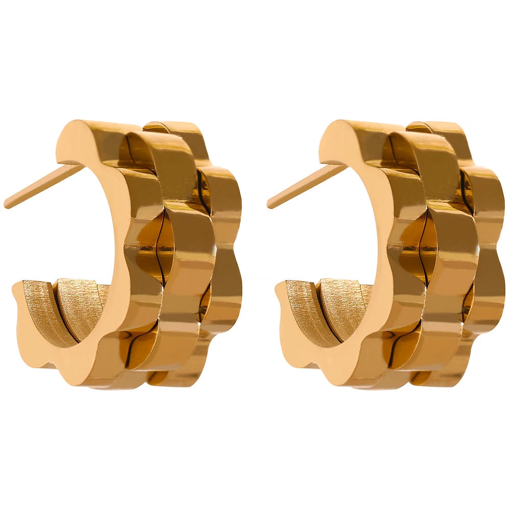 Three gold-plated stainless steel earrings featuring a large circular design with a smaller circle inside.