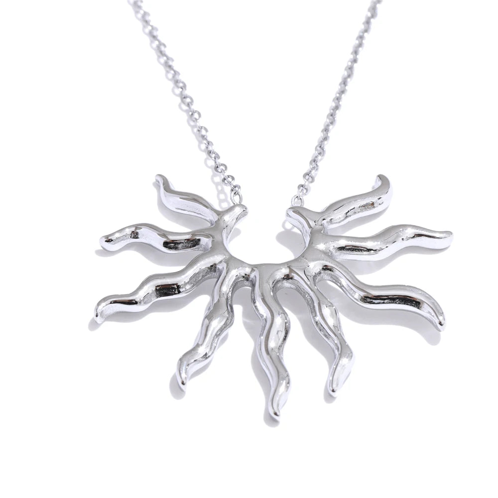 Sun geometric necklace in gold-plated stainless steel.