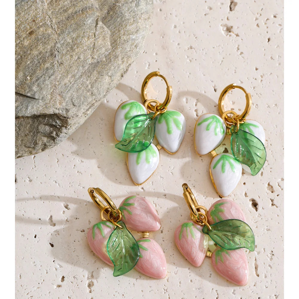 White geometric earrings in gold-plated stainless steel.