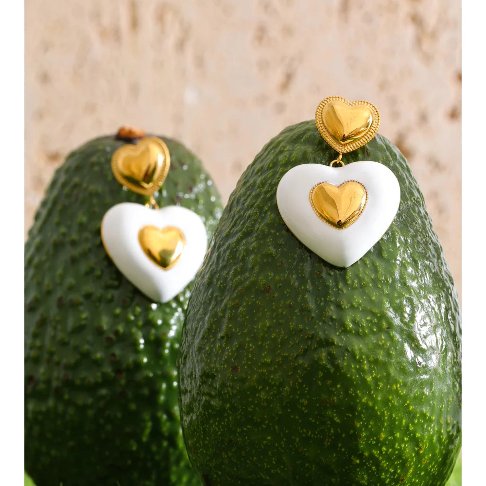 White enamel heart earrings in gold-plated stainless steel with enamel.