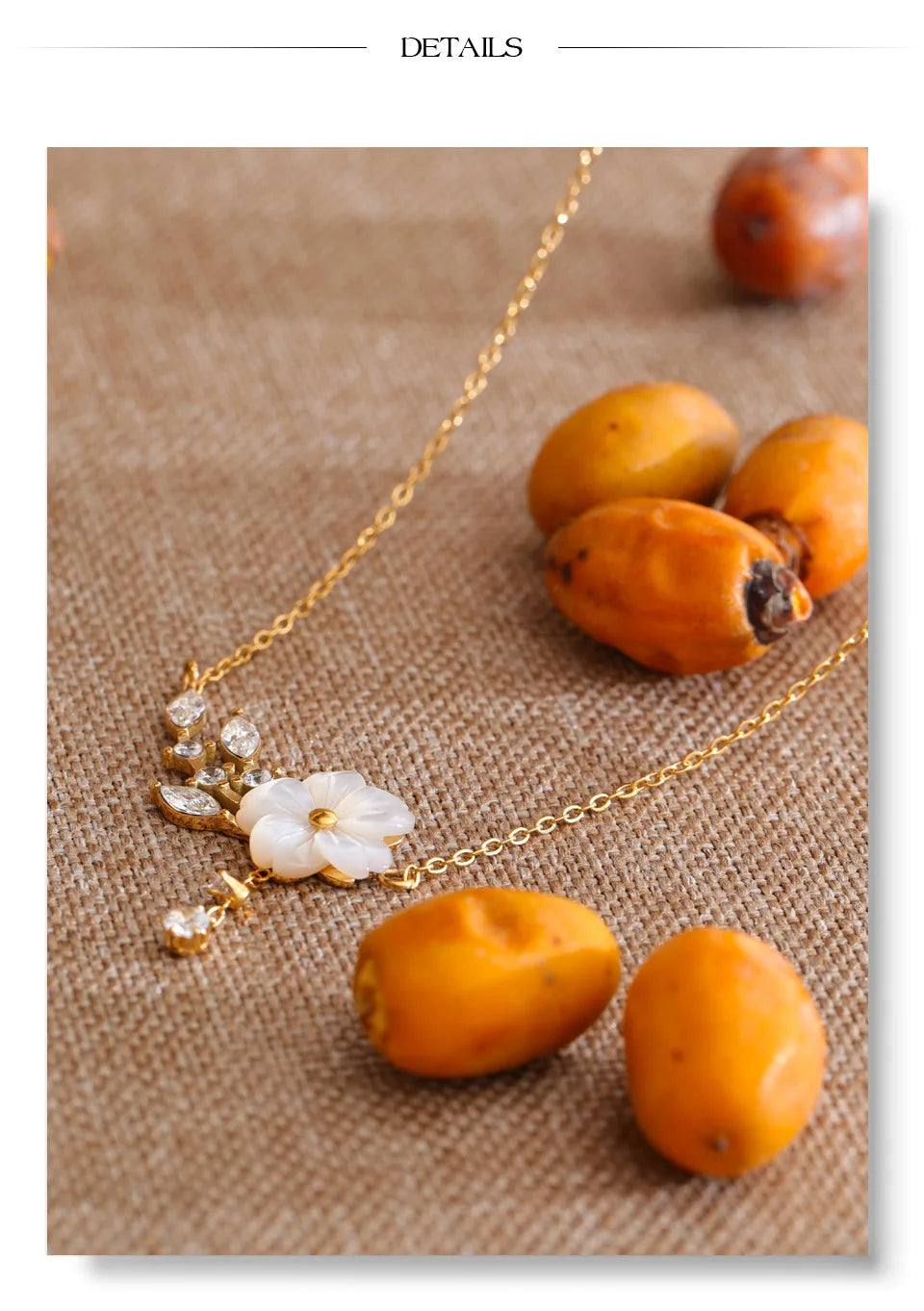 Cubic zirconia shell flower necklace in gold-plated stainless steel with cubic zirconia and shell.