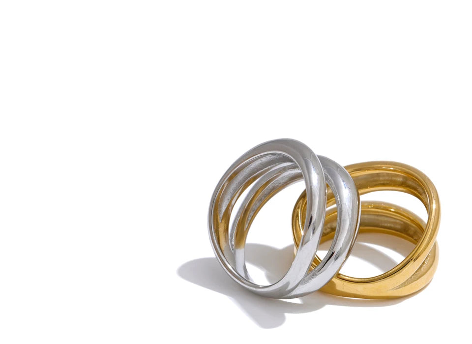 Geometric layered ring in gold-plated stainless steel.