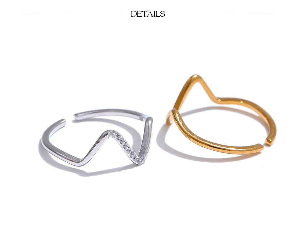Cubic zirconia geometric ring in 18K gold-plated stainless steel with cubic zirconia.