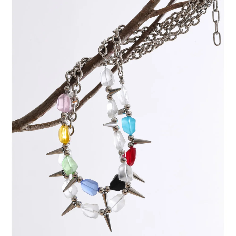 Acrylic natural stone multi-color necklace in gold-plated stainless steel with natural stone and acrylic.