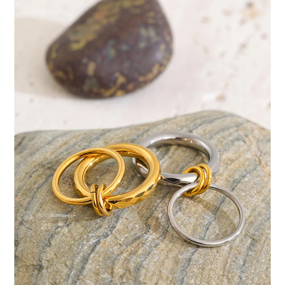 Geometric ring in 18K gold-plated stainless steel.