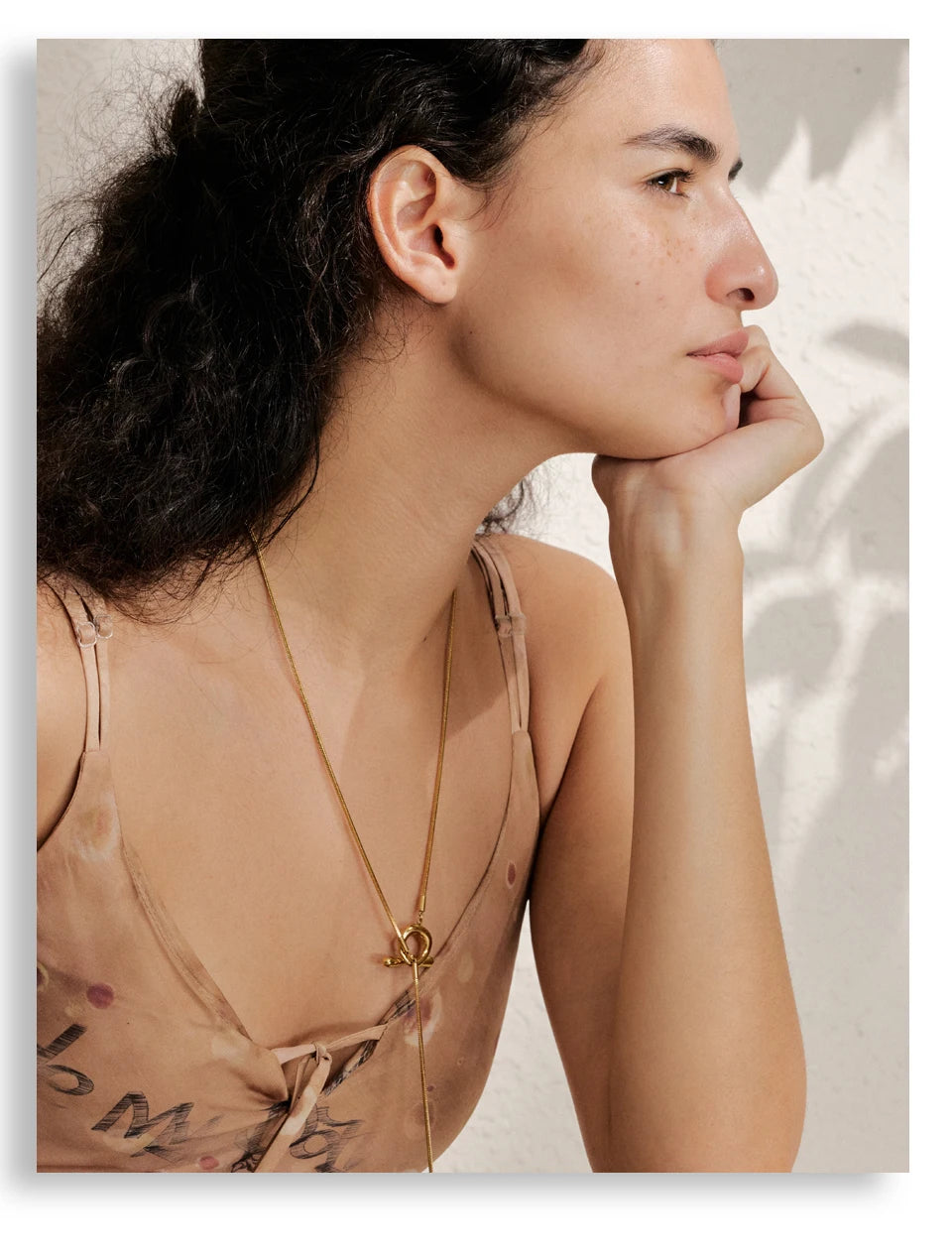 Geometric chain necklace in gold-plated stainless steel.