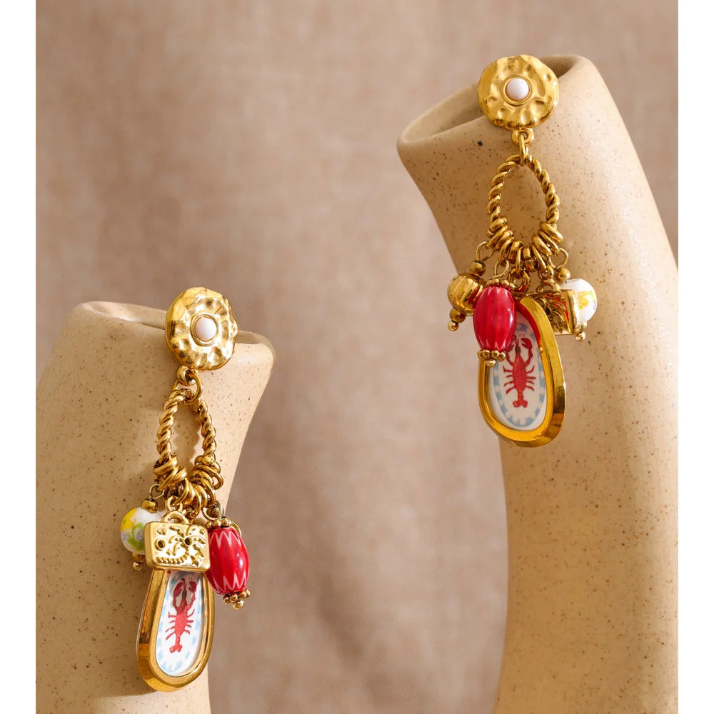 Geometric earrings in gold-plated stainless steel.