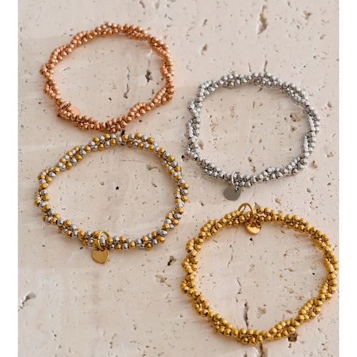 Beaded geometric bracelet in gold-plated stainless steel.