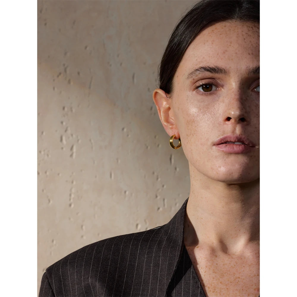 Geometric earrings in gold-plated stainless steel.