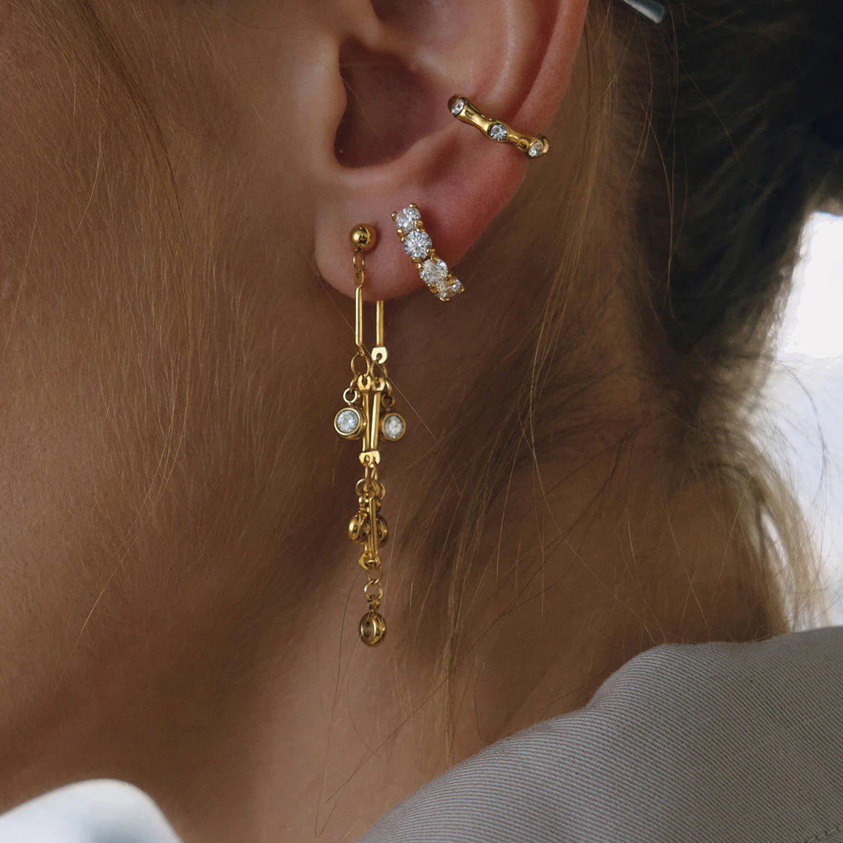 Wavy CZ Stud Earrings — Stainless Steel · PS377