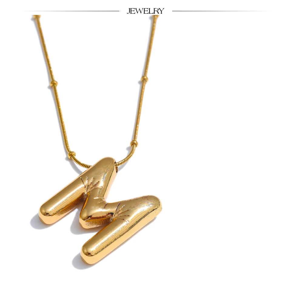Geometric chain necklace in gold-plated stainless steel.