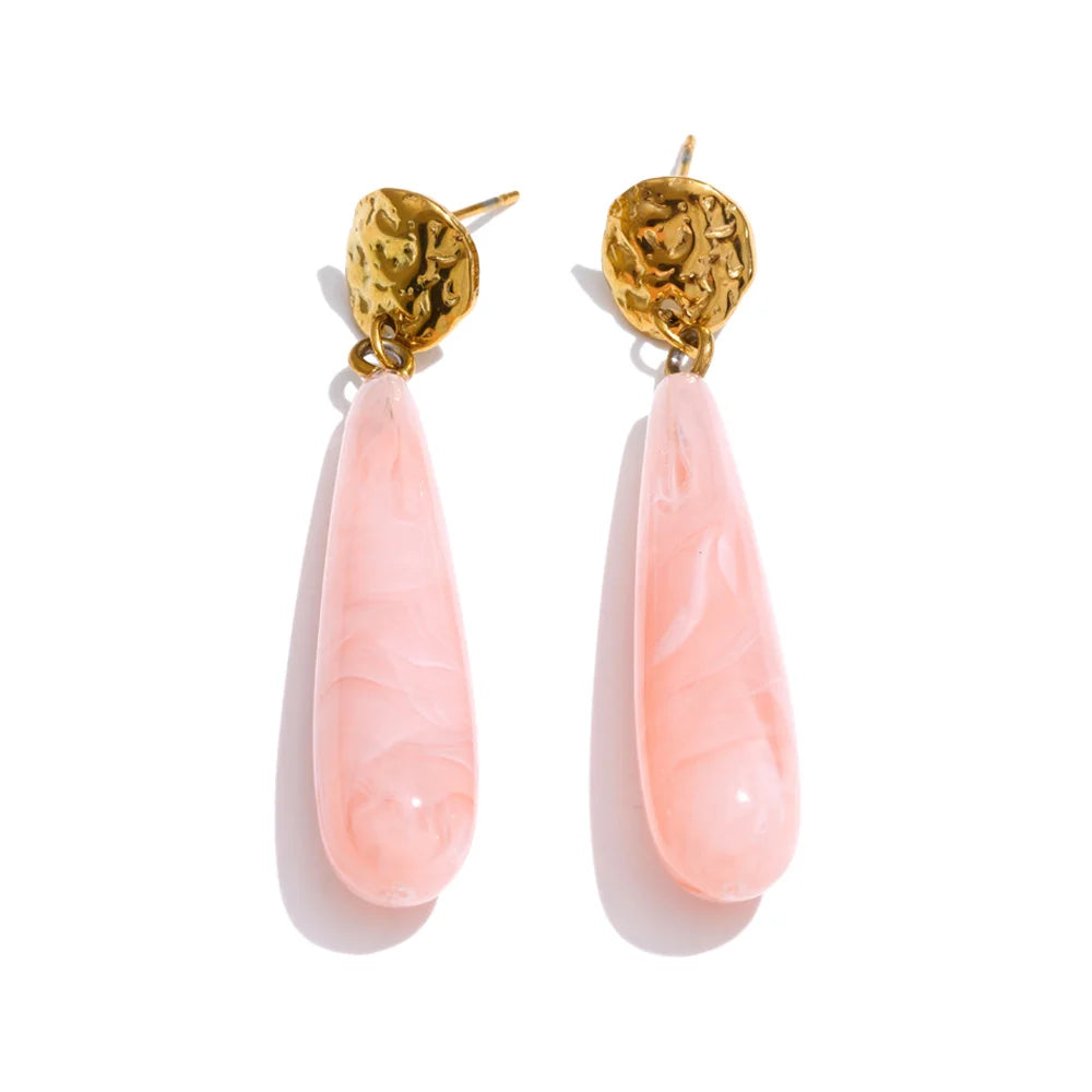 Resin earrings in gold-plated stainless steel with resin.