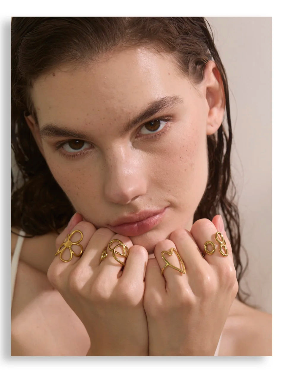 Geometric ring in gold-plated stainless steel.