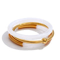 Resin acrylic multi-color bracelet in gold-plated stainless steel with resin and acrylic.