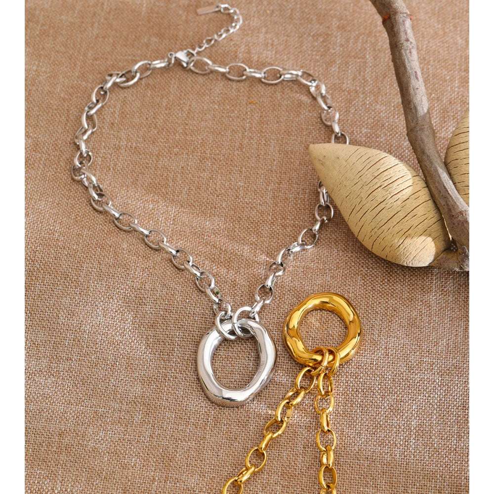 Coin geometric necklace in gold-plated stainless steel.