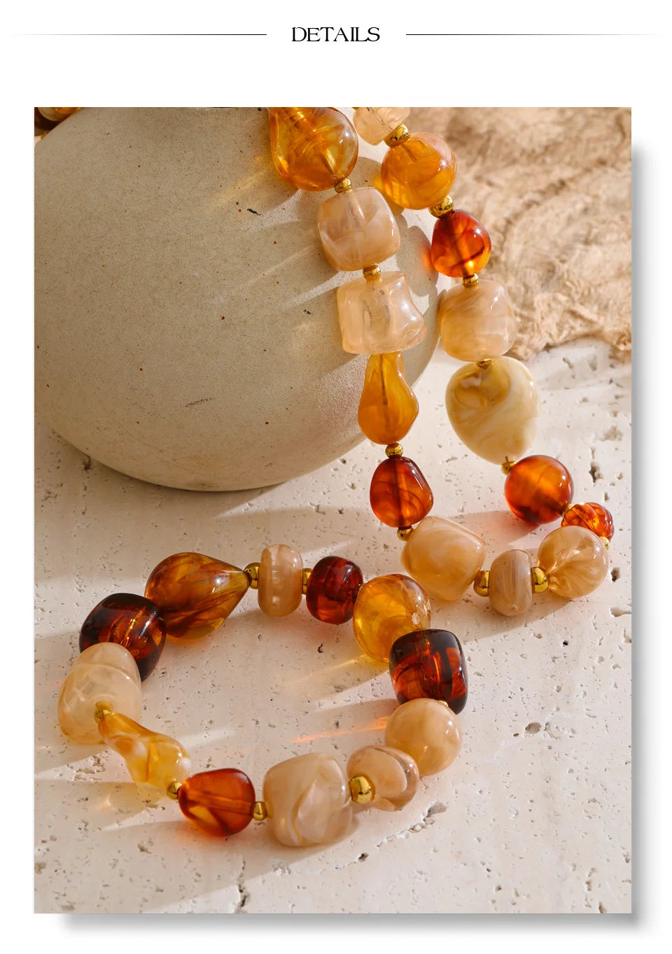 Resin acrylic beaded necklace in gold-plated stainless steel with resin and acrylic.
