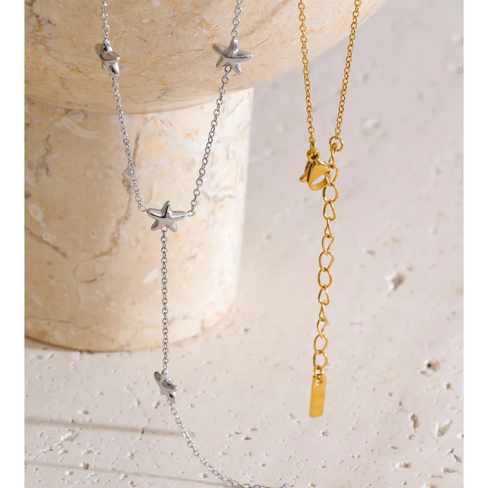 Star chain necklace in gold-plated stainless steel.