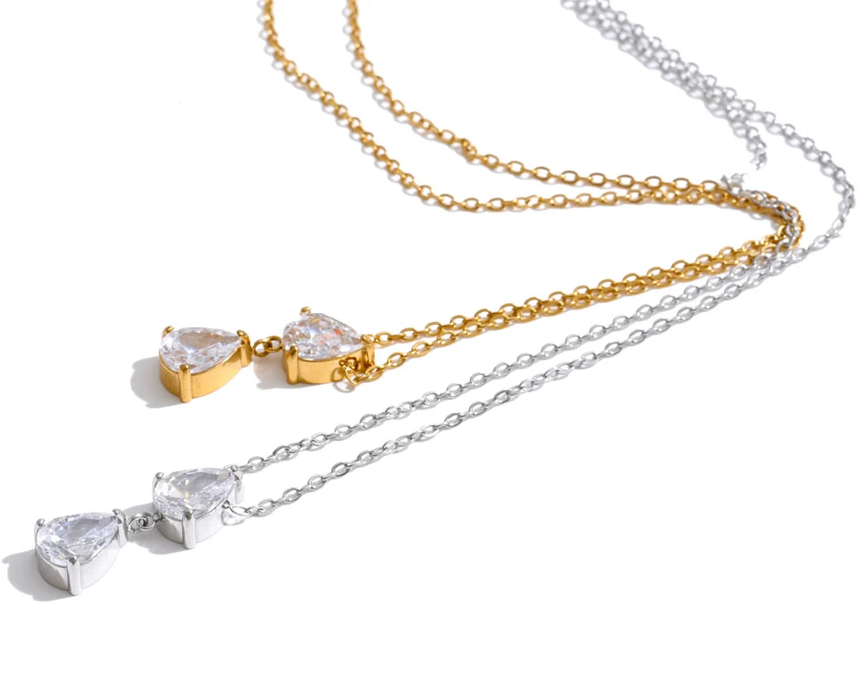 Cubic zirconia geometric necklace in gold-plated stainless steel with cubic zirconia.
