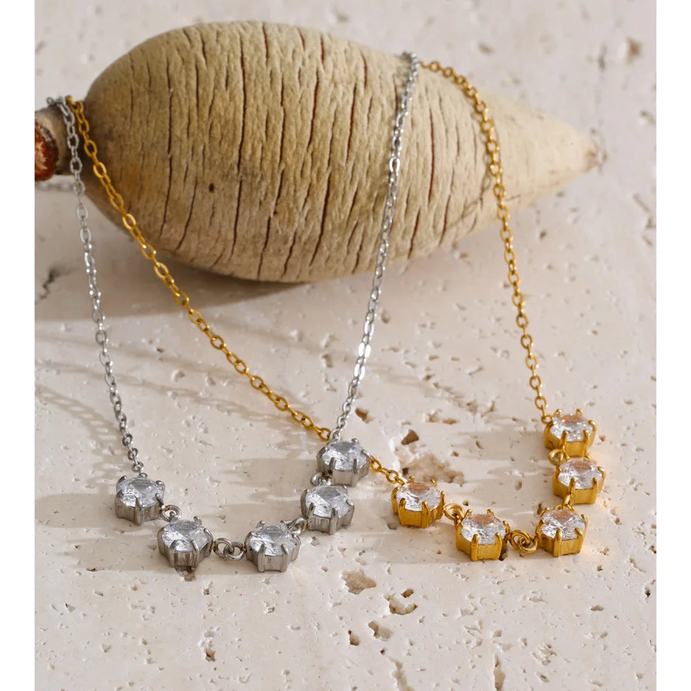 Cubic zirconia geometric necklace in gold-plated stainless steel with cubic zirconia.