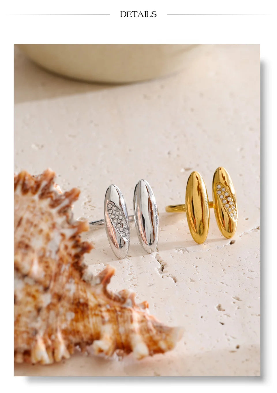 Cubic zirconia geometric ring in 18K gold-plated stainless steel with cubic zirconia.