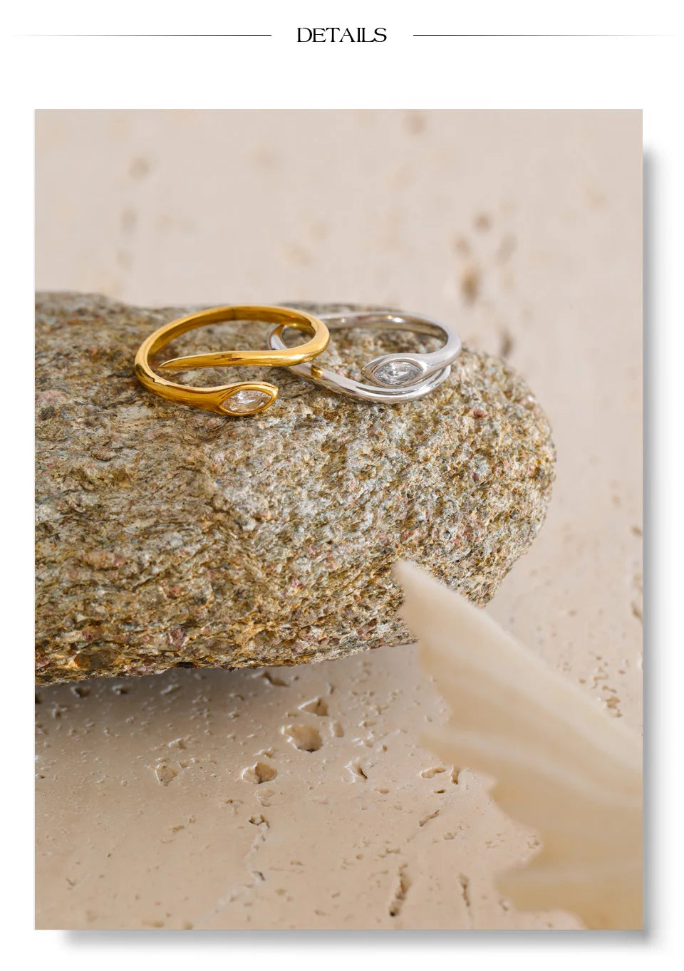 Cubic zirconia snake geometric ring in 18K gold-plated stainless steel with cubic zirconia.