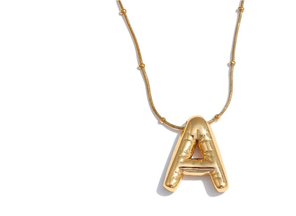 Geometric chain necklace in gold-plated stainless steel.