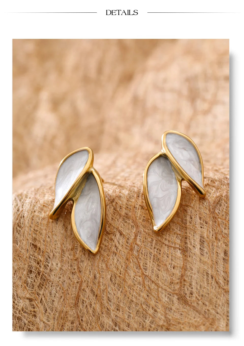 White enamel earrings in gold-plated stainless steel with enamel.